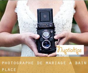 Photographe de mariage à Bain Place